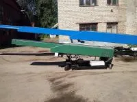 Конвейер ленточный раздвижной с рольгангом для перехода груза